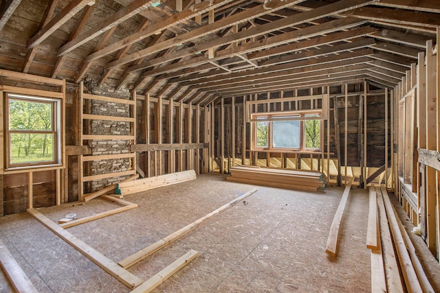 miscellaneous room featuring lofted ceiling