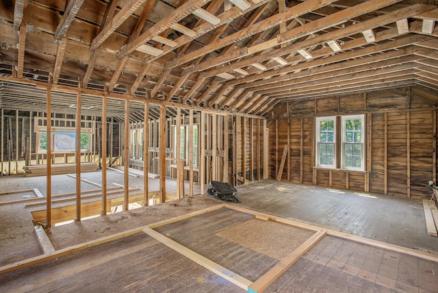 misc room with lofted ceiling