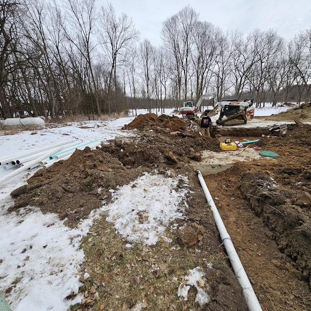 view of yard layered in snow