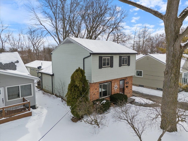 view of front of home with brick siding