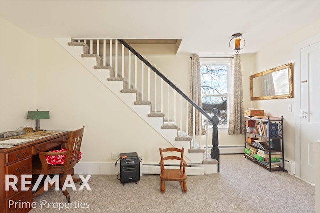 stairs featuring baseboards, carpet flooring, and baseboard heating