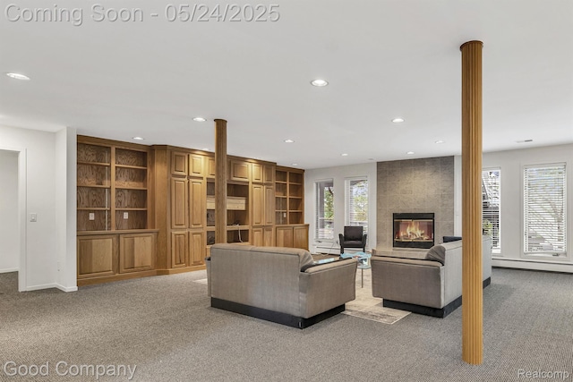 28036 Hickory Cir, Farmington Hills, MI 48331 - living room with light carpet, recessed lighting, a large fireplace, and baseboards