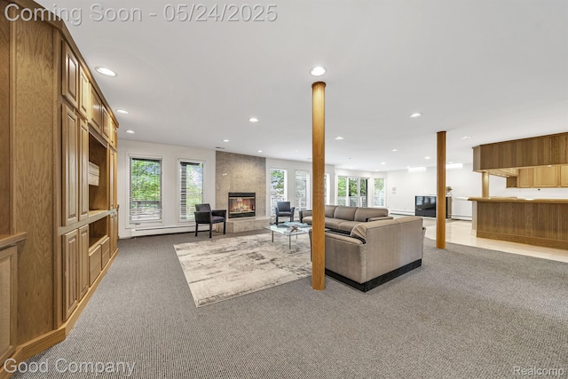 28036 Hickory Cir, Farmington Hills, MI 48331 - carpeted living room with a fireplace, plenty of natural light, and recessed lighting