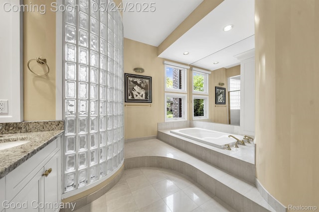 28036 Hickory Cir, Farmington Hills, MI 48331 - bathroom featuring baseboards, tile patterned floors, a garden tub, vanity, and recessed lighting