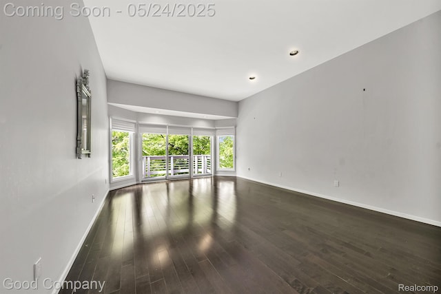 28036 Hickory Cir, Farmington Hills, MI 48331 - unfurnished room featuring baseboards, dark wood finished floors, and recessed lighting
