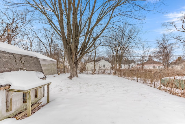 view of yard covered in snow