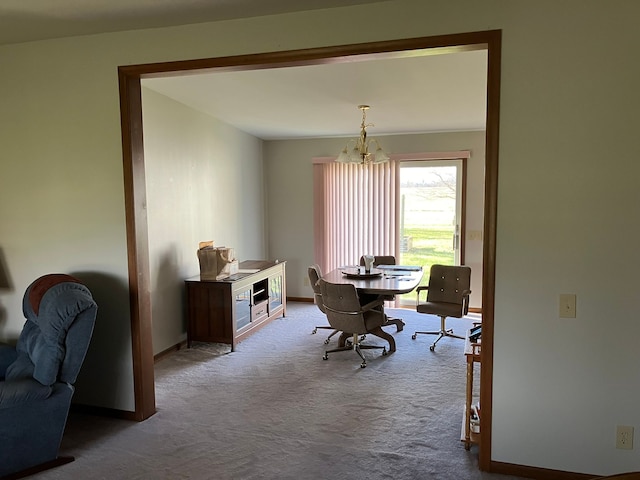 carpeted home office with an inviting chandelier and baseboards