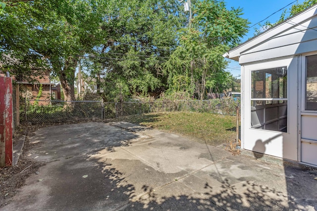 view of patio / terrace featuring fence