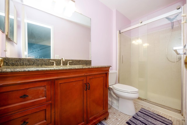 bathroom with toilet, a stall shower, tile patterned flooring, and vanity