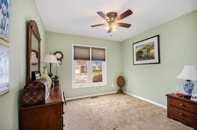 bedroom with a ceiling fan, carpet flooring, visible vents, and baseboards