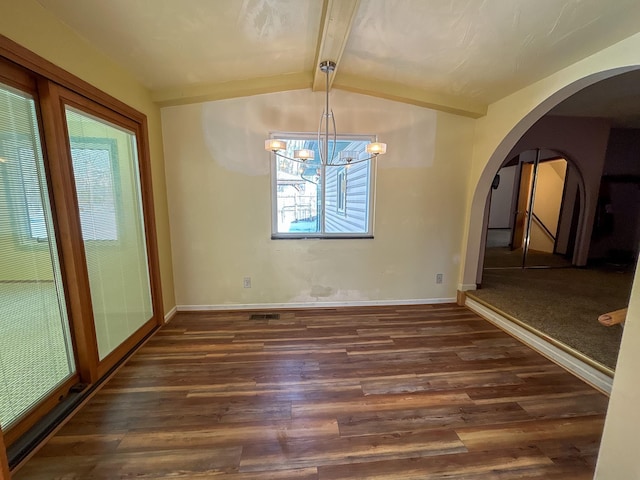 unfurnished dining area featuring arched walkways, dark wood-type flooring, baseboards, and vaulted ceiling with beams