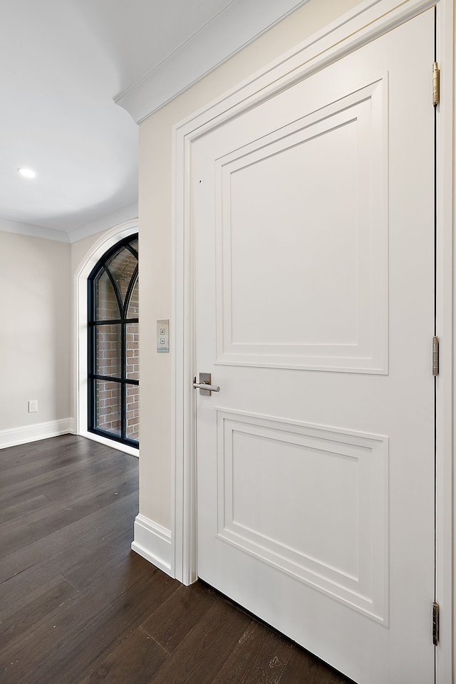 interior details with recessed lighting, crown molding, baseboards, and wood finished floors