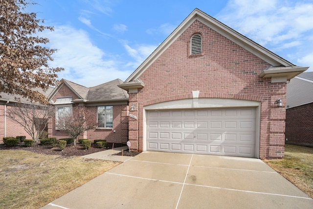 view of front facade featuring a garage, concrete driveway, brick siding, and a shingled roof