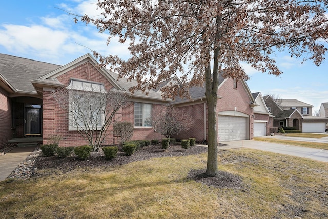 view of front of house featuring an attached garage, brick siding, concrete driveway, roof with shingles, and a front lawn