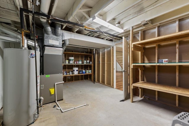 unfinished basement featuring gas water heater