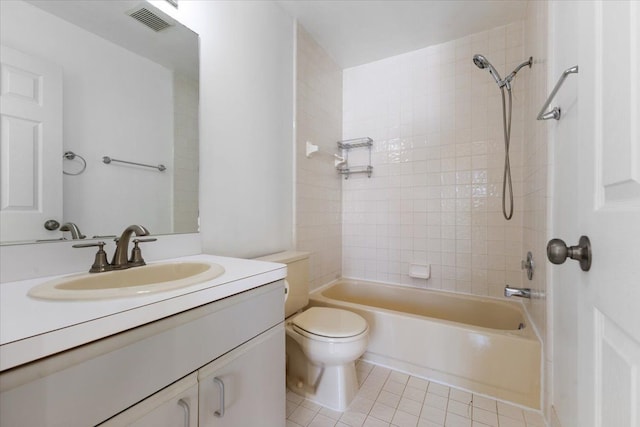 full bath with bathtub / shower combination, toilet, vanity, visible vents, and tile patterned floors