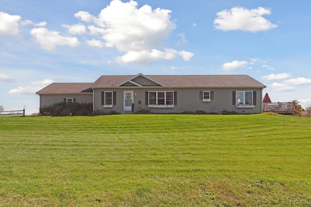 ranch-style house with a front yard