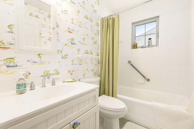 bathroom featuring shower / bath combination with curtain, vanity, toilet, and wallpapered walls