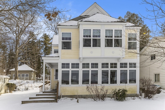 view of snow covered property