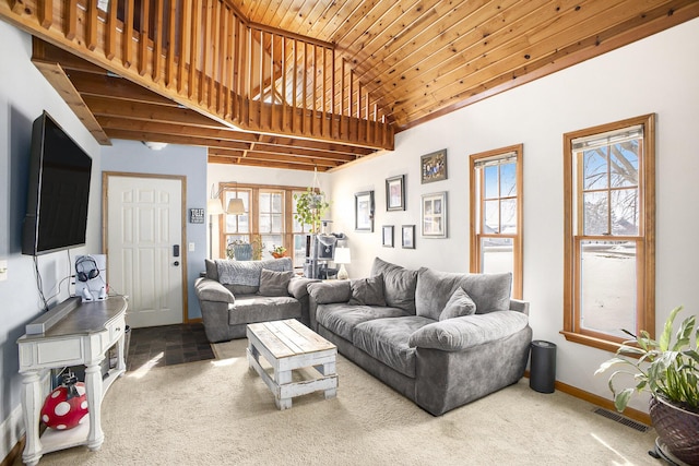 carpeted living area featuring visible vents, high vaulted ceiling, wood ceiling, and baseboards