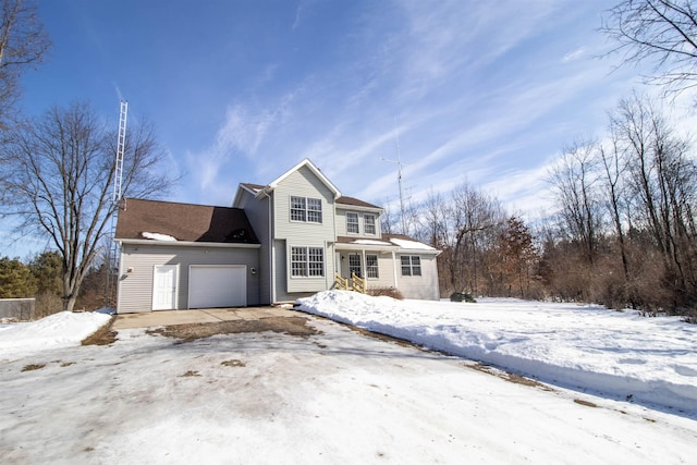 traditional-style home featuring an attached garage