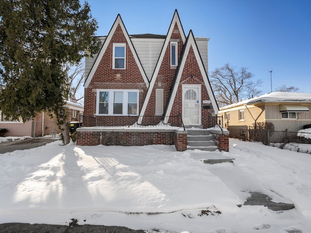 view of front of home featuring brick siding