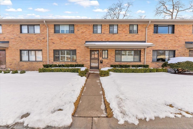 multi unit property featuring brick siding