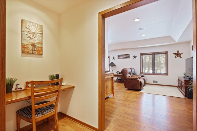 interior space featuring light wood-style flooring, visible vents, baseboards, and recessed lighting