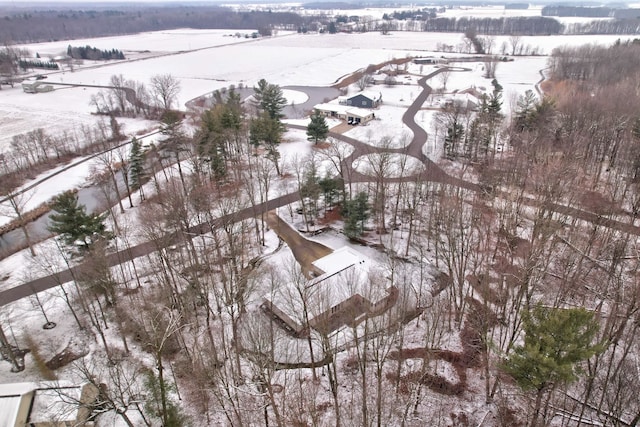 snowy aerial view with a rural view