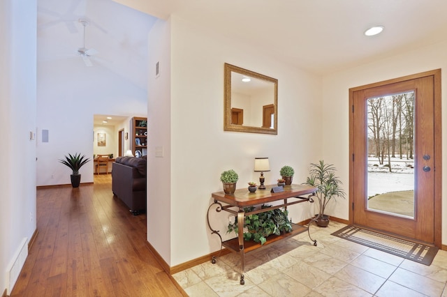 entrance foyer with baseboards, visible vents, wood finished floors, and recessed lighting