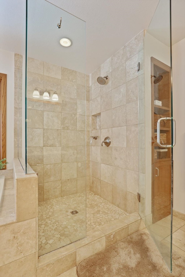 bathroom featuring a stall shower and tile patterned floors