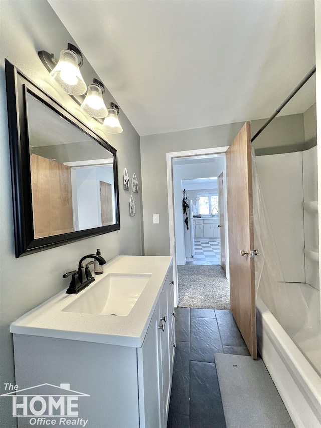 bathroom with shower / bath combination and vanity