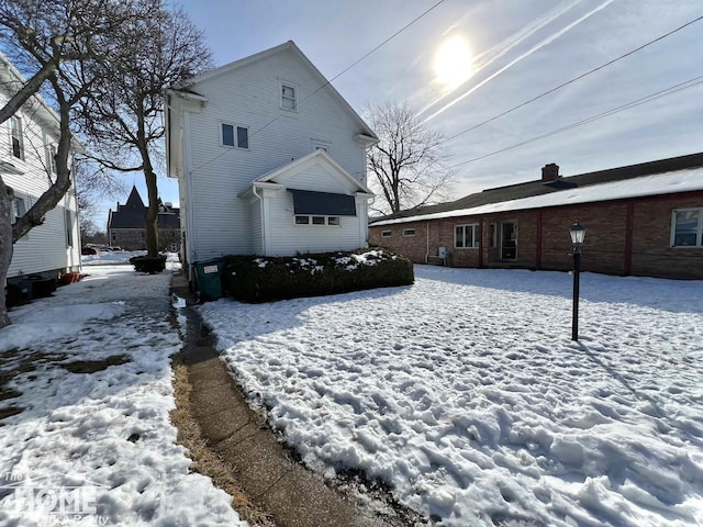 view of snow covered property