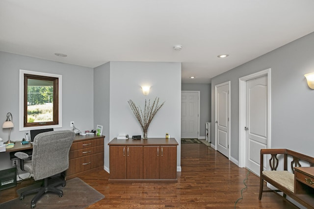 office with recessed lighting, dark wood-style flooring, and baseboards