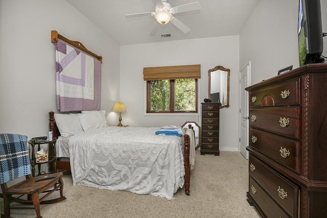 bedroom featuring baseboards, visible vents, and a ceiling fan