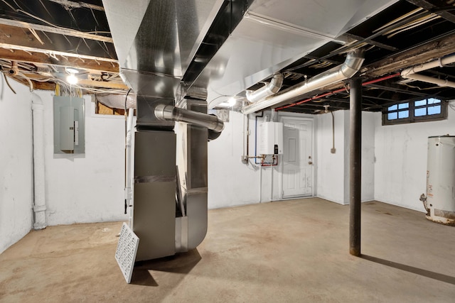 below grade area featuring electric panel, heating unit, and water heater