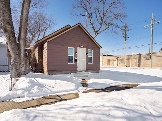 view of front of house with fence