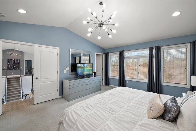 bedroom featuring light colored carpet, baseboards, a notable chandelier, and vaulted ceiling