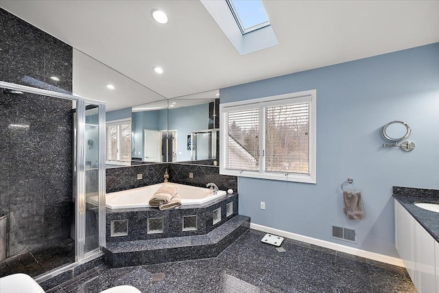 full bath with a garden tub, visible vents, and a stall shower