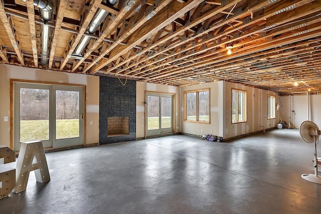 interior space featuring a healthy amount of sunlight and concrete floors