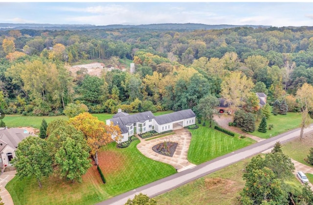 bird's eye view featuring a view of trees