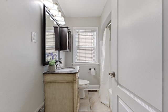 full bathroom featuring toilet, tile patterned floors, vanity, baseboards, and a shower with curtain