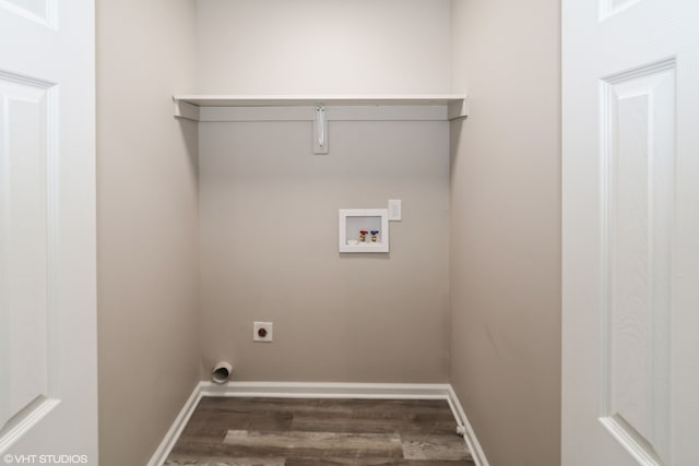 clothes washing area with laundry area, dark wood-type flooring, washer hookup, baseboards, and electric dryer hookup