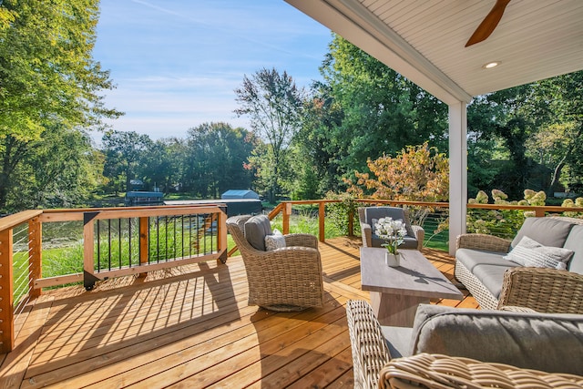 deck featuring ceiling fan, grilling area, and outdoor lounge area