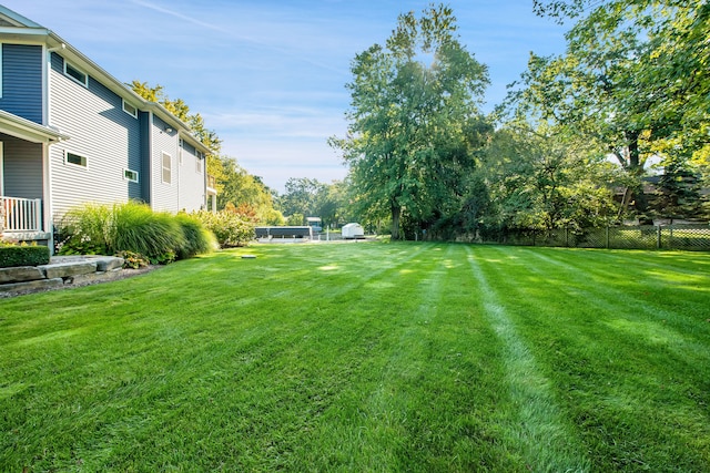 view of yard with fence