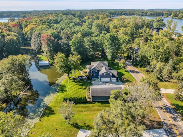 bird's eye view featuring a water view and a view of trees