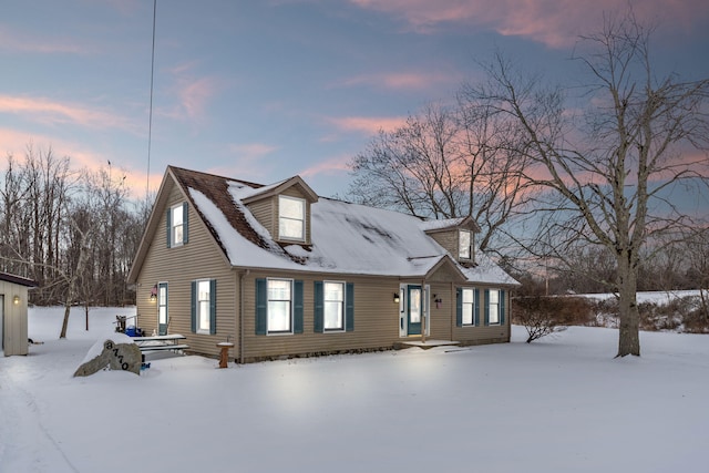 view of new england style home