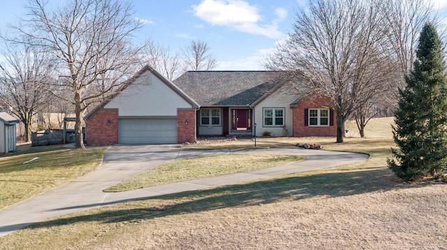 ranch-style house featuring a garage, concrete driveway, brick siding, and a front yard