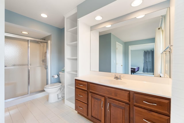 full bathroom with toilet, recessed lighting, vanity, a shower stall, and tile patterned floors