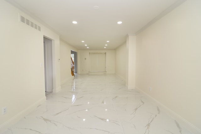 corridor featuring recessed lighting, marble finish floor, visible vents, and baseboards